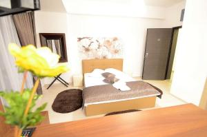 Studio with Balcony room in Uptown Residence Apartments