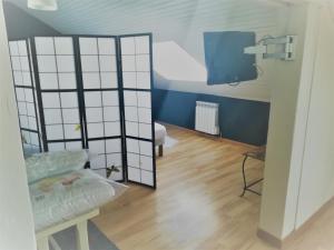 Appartements Le Petit Loft Vosgien : photos des chambres