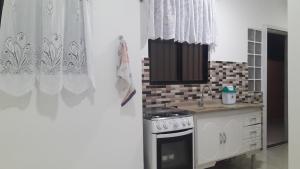 CASA 01 DORM TERRENO COMPARTIDO