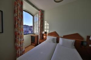 Double or Twin Room with Private Bathroom room in Pensao Praca Da Figueira