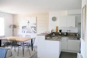 Maisons de vacances Comme a la maison, Vue sur les Salines : photos des chambres