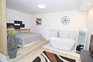 SeNs Apartments by Belmont Realty