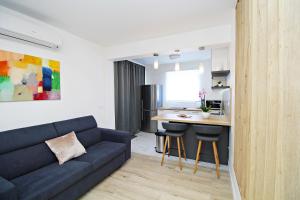 SeNs Apartments by Belmont Realty