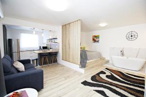 SeNs Apartments by Belmont Realty