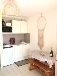 Les Capitelles Bord de plage avec grande piscine - Vue montagne - Balcon - Clim