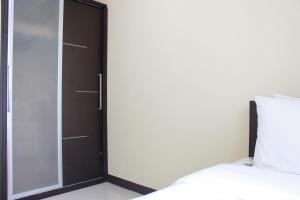 Deluxe & Cozy 4BR Galeri Ciumbuleuit Apartment By Travelio