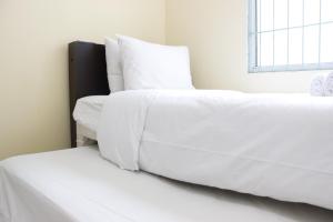 Deluxe & Cozy 4BR Galeri Ciumbuleuit Apartment By Travelio