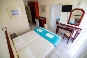 Quadruple Room with Balcony room in Dionisos Hotel