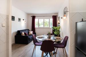 Appartements Les Sorbiers - CENTRE VILLE - Spacieux & Climatisation : photos des chambres