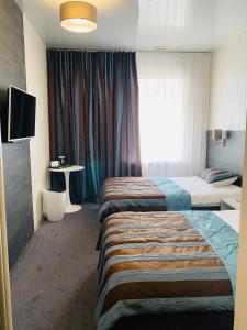Deluxe Twin Room room in Status Hotel
