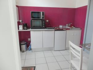 Appartements Appartement T2 ou T1 cote cour/jardin avec garage : photos des chambres