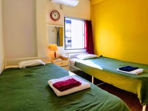 Guesthouse LuLuLu 無料朝食&夕食カレー 街まで電車8分 ローソン隣 - 1hvězdičkové hotely ve městě Koči