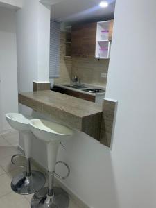 Apto cerca del CC Titan Plaza 102