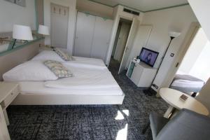 Hotels Les Portes de la Vallee : photos des chambres