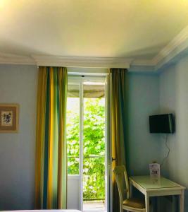 Hotels Le Grand Hotel : photos des chambres