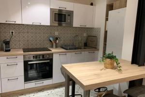 Appartements Le jardin des Capucins : photos des chambres