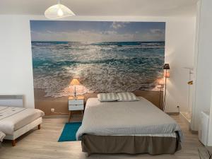 Appartements L'Appartement de la Maison du Theatre Saint Bonnet : photos des chambres