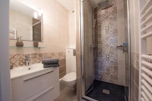 Appartements Ma Location Sablaise - Appart' Les Pins : photos des chambres