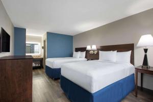 Double Room with Two Double Beds - Non-Smoking room in Days Inn by Wyndham Orlando Conv. Center/International Dr