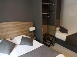 Hotels Hotel du Commerce : photos des chambres