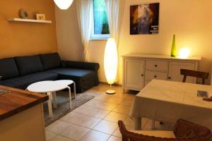 Ferienapartment am See mit Kajak SUP Verleih