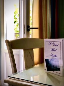Hotels Le Grand Hotel : photos des chambres
