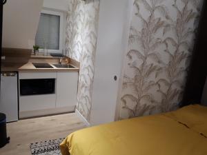 Appartements L'Essentiel, studio cosy, quartier Anatole France, CHU : photos des chambres