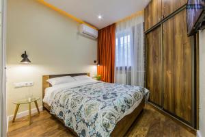 One-Bedroom Apartment room in Kyiv Orange Loft