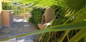 Appartamento con giardino sul mare