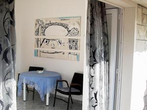 Apartment for two persons with sea view in Trogir near the beach