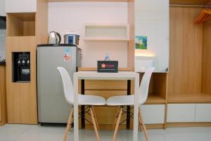 Simple Studio Apartment at Grand Kamala Lagoon By Travelio
