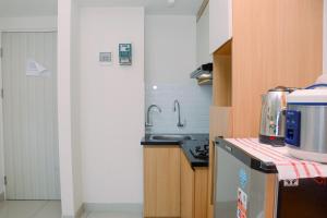 Simple Studio Apartment at Grand Kamala Lagoon By Travelio