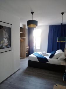 Hotels Les Remparts : photos des chambres