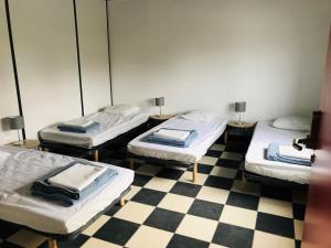 Maisons de vacances Hebergements le Camp d'Auneau - Le Clos du Camp : photos des chambres