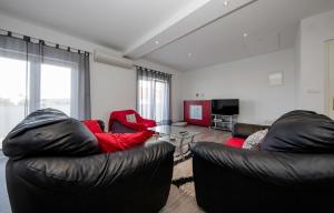 Two-Bedroom Apartment with Terrace and Sea View room in Apartments with a parking space Palit Rab - 4971