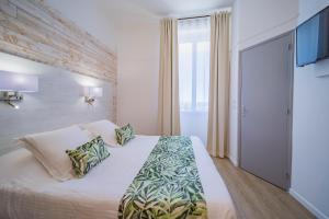 Hotels Le Rabelais : photos des chambres