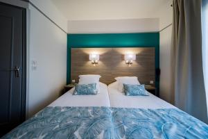 Hotels Le Rabelais : photos des chambres