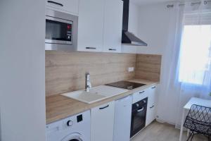 Appartements Dolmen Adrien 2 : photos des chambres