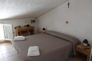 Camera Matrimoniale/Doppia con Letti Singoli con Bagno in Comune
