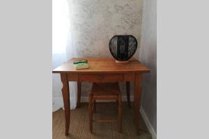 Appartements Le charme de l ancien entre mer et ville : photos des chambres