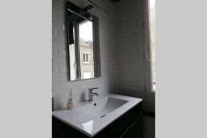 Appartements Le charme de l ancien entre mer et ville : photos des chambres