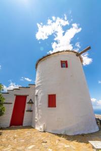 Old Windmill in Triandaros village Tinos Greece