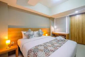 Comfortable 1BR Apartment at Mustika Golf Residence By Travelio - Pegadungan