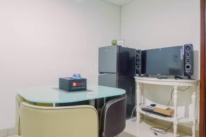 Lavish 2BR Apartment at Grand Sungkono Lagoon By Travelio