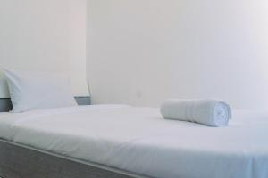 Lavish 2BR Apartment at Grand Sungkono Lagoon By Travelio