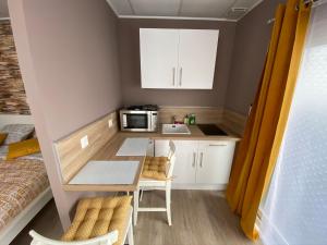 Appartements Logements equipes a Onnaing avec espace Balneo en OPTION proche Toyota, autoroute et Valenciennes : photos des chambres