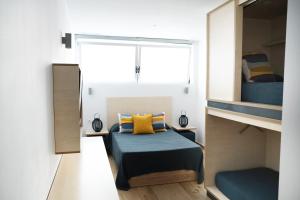 Superior room with private interior bathroom room in TAKE SURF Hostel Conil