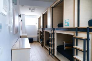 Bed in 8-Bed Mixed Dormitory Room room in TAKE SURF Hostel Conil