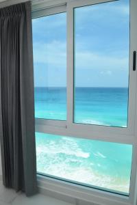 Nuevo estudio a pie de playa, vistas increibles, alberca, gym jacuzi, seguridad, 3503