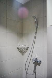 Minimalist Studio Bintaro Icon Apartment near British School By Travelio